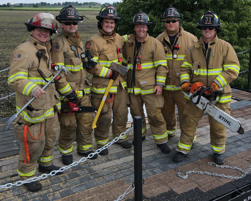 Sycamore firefighter Brad Belanger (second from the right in the 23 helmet) resigned from the DeKalb County Board this month after receiving a cancer diagnosis during the fall 2022. It was Belanger's first elected role after clinching a seat in the November 2022 election.