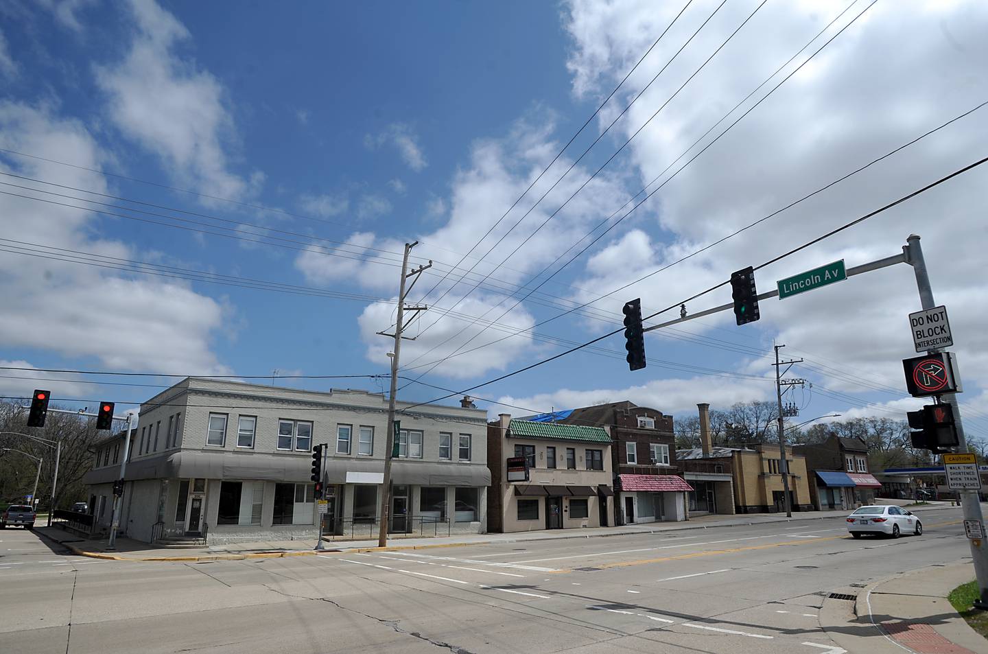 A three-story building with retail space and 80 apartments plus indoor and outdoor parking has been proposed to replace these buildings on Route 14 between Lincoln Avenue and Illinois Street in Fox River Grove.