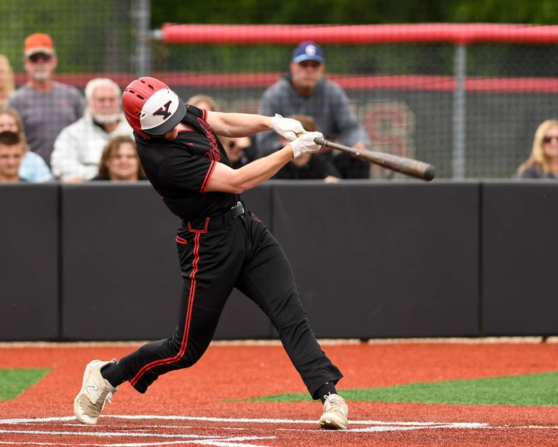 Yorkville's Colin Griffin (21) gets a base hit on Thursday May 29, 2025, while taking on Romeoville in the regional game held at Yorkville High School.