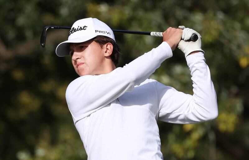 Sycamore’s Andrew Swedberg tees off on the par three fourth hole Monday, Sept. 23, 2024, during the Interstate 8 boys golf tournament at the Kishwaukee Country Club in DeKalb.