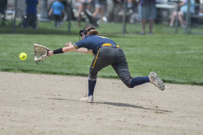The ball is just out of reach for Sterling shortstop Katie Taylor Saturday, May 28, 2022.