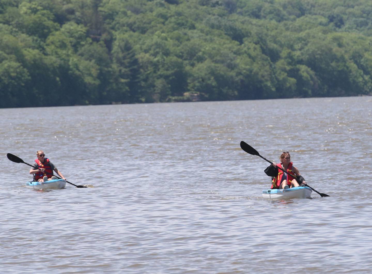 Emma and Abby Happ both of Peru, kayak along the Illinois River near Lone Point Shelter on Tuesday, May 16, 2023 at Starved Rock State Park. When Louis Joliet and Father Jacques Marquette explored the Illinois River in 1673 it was much shallower in this area at the time.