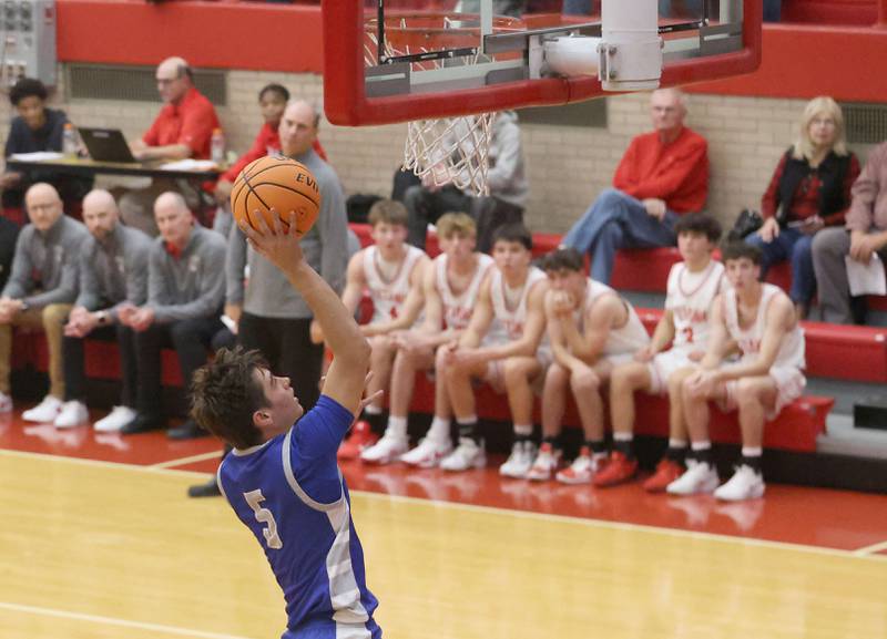 Princeton's Jack Oester runs in all alone to score on a layup against Ottawa during the Dean Riley Shootin' The Rock Thanksgiving Tournament on Monday Nov. 24, 2025 in Kingman Gymnasium at Ottawa High School.