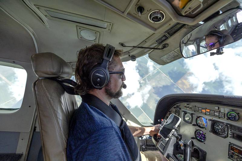 Pilot Dan Guendner brings the plane back to the airport Friday, June 27, 2025, in Rochelle after the first round of skydivers.