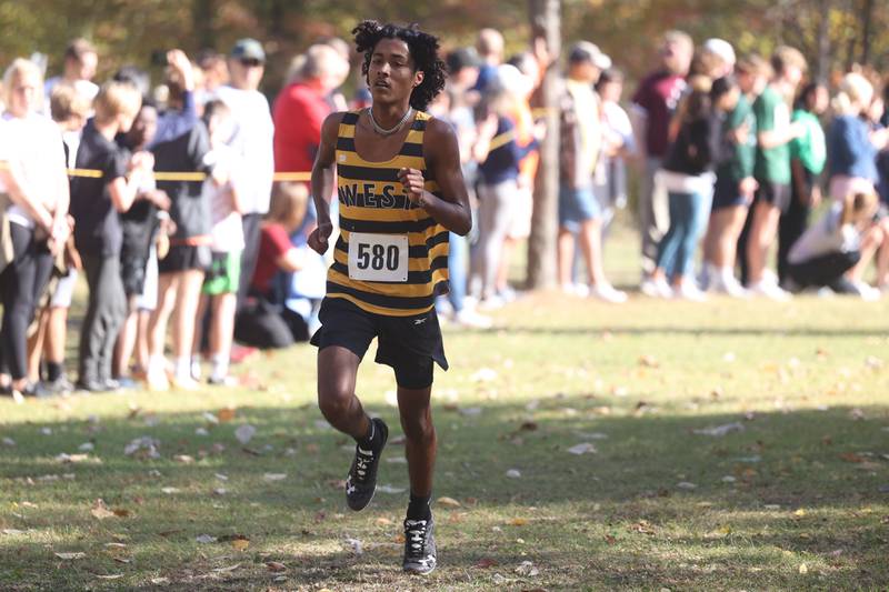Joliet West’s Marcellus Mines finishes 4th in the Boys Cross Country Class 3A Minooka Regional at Channahon Community Park on Saturday.