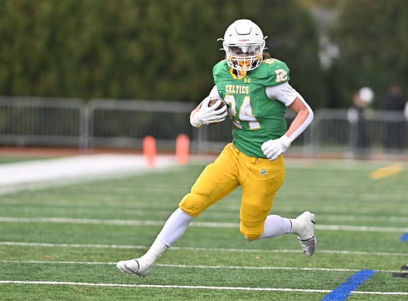 Providence Catholic's Broden Mackert (24) runs the ball during the class 5A first round playoff game against Springfield on Saturday, NOV. 01, 2025, at New Lenox.