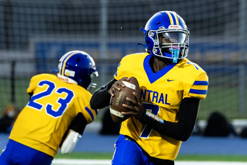 Joliet Central's Jeffrey Woods looks for an open teammate during a varsity football home game against Plainfield Central on Sept. 26. 2025.