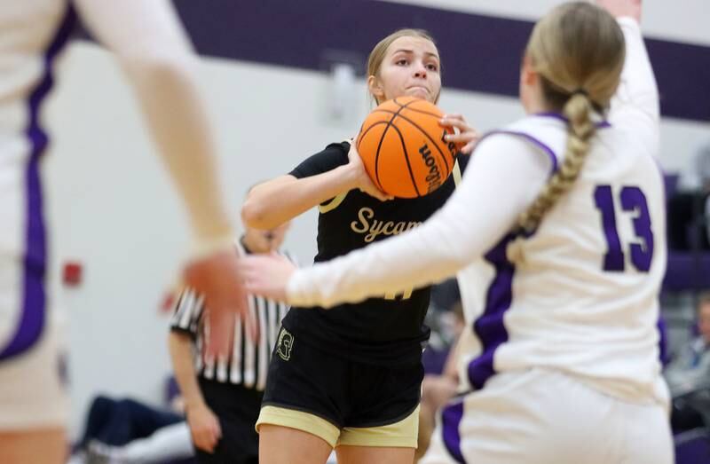 Sycamore’s Macy Calendo takes an outside shot in varsity girls basketball on Friday, Jan. 3, 2025, at Hampshire High School in Hampshire.