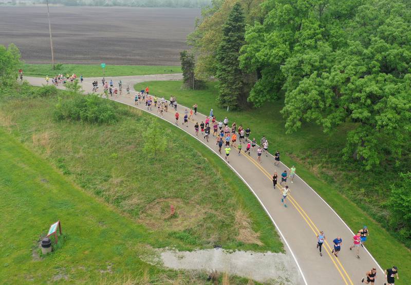 Runners begin the Starved Rock Country Half Marathon on Saturday, May 13, 2023 at Starved Rock State Park.