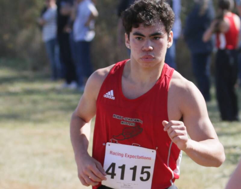 Henry-Senachwine's Nico Yee runs in the Class 1A Regional Cross Country boys race on Saturday, Oct. 22, 2022 at the Seneca FFA Farm in Marseilles.