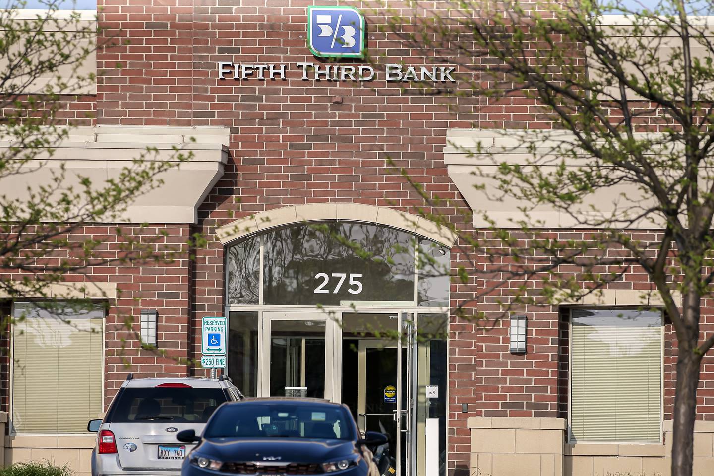 Officers at the scene of a hostage situation on May 10, 2022 at Fifth Third Bank in Romeoville.