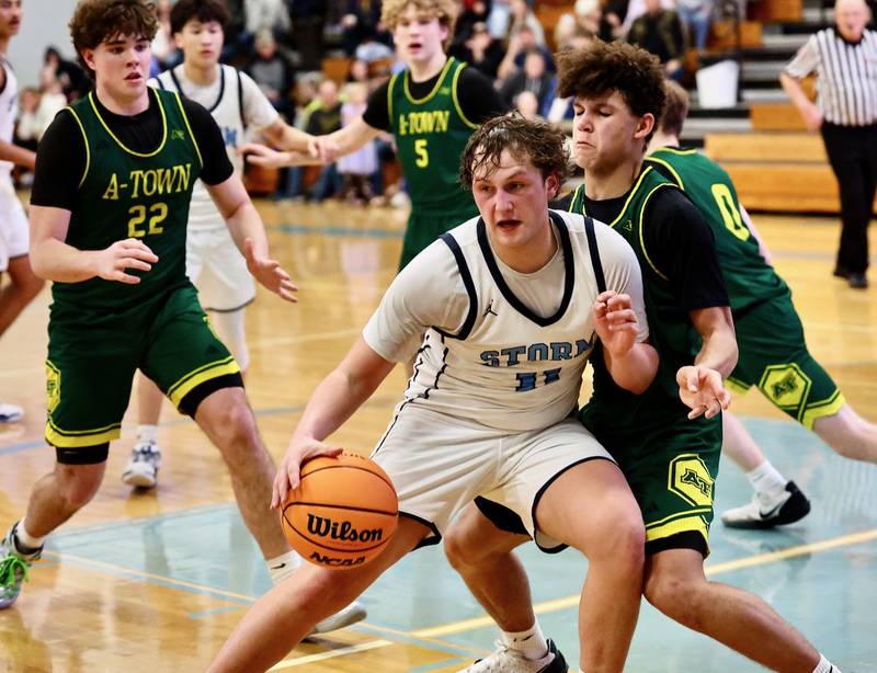 Bureau Valley's Blake Foster makes his move against Abingdon-Avon's Tre Kenon for the game-tying basket Friday night at the Storm Cellar. A-Town won 47-45.