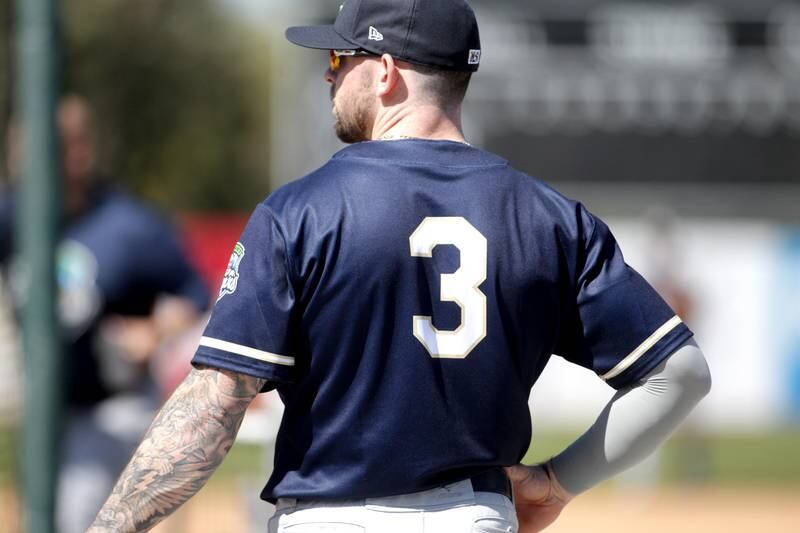 Jimmy Kerrigan waits for his turn in the cage during a practice at Northwestern Medicine Field in Geneva on Thursday, May 4, 2023. The Cougars’ season opens May 11.