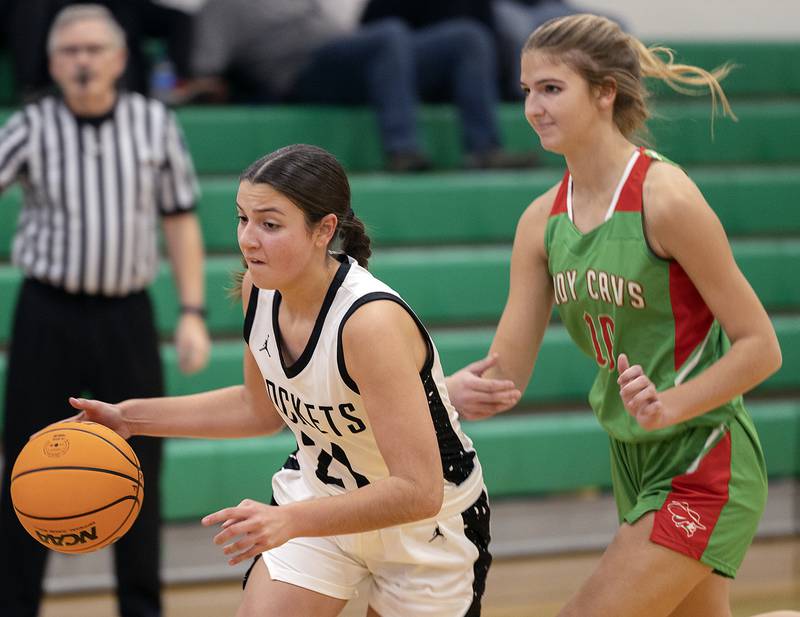 Rock Falls’ Julia Renner drives to the hoop against L-P’s Kelsey Frederick Saturday, Nov. 30, 2024.