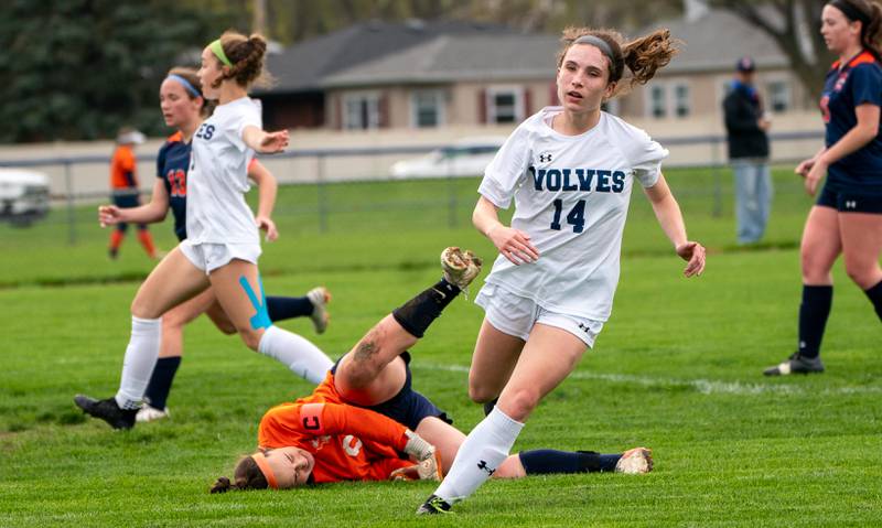 Oswego East's Taylor English (14) scores a goal against Oswego during a soccer match at Oswego High School on Monday, May 2, 2022.