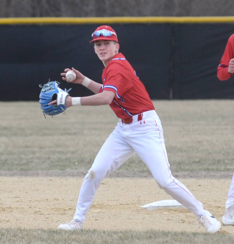 Morrison's Kaleb Schroeder fields a ground ball and prepares to throw a Fulton runner out at first on Friday, March 21, 2025 at Drives Field in Fulton.