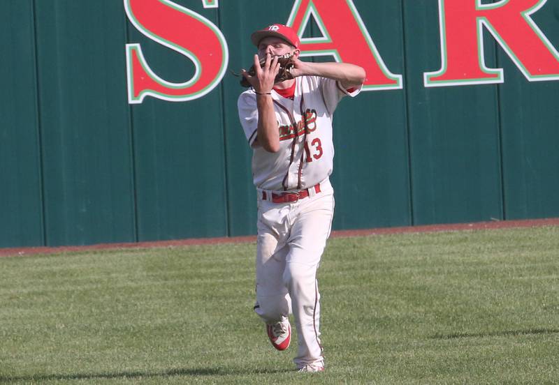 L-P's Jett Hill squeezes his glove to make an out against Kaneland on Tuesday, May 13, 2025 at Huby Sarver Field at the L-P Athletic Complex in La Salle.