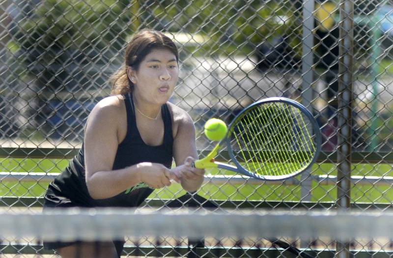 Eva Cervantes of La Salle Peru High competes in the #1 singles match against United 
Township Saturday at Hegeler Park in La Salle.