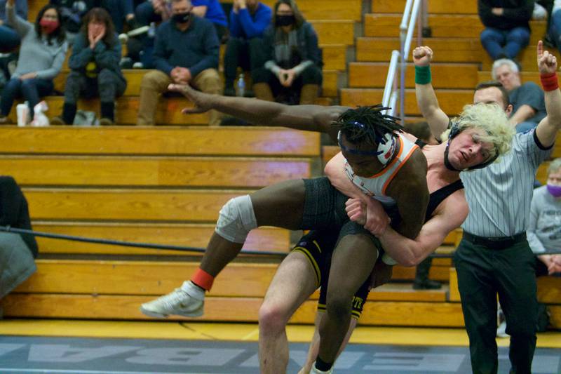 St. Charles East's Elijah Chiaro wrestles Glenbard North's Cody Detz in the 170-pound championship round at the DuKane Conference at Glenbard North on Jan. 29, 2022 in Carol Stream.