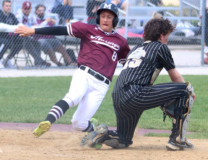 Marengo’s Quinn Lechner slides safely into home against Rockford Christian in IHSA Class 2A Regional Title Game action baseball at Richmond-Burton High School in Richmond  on Saturday, May 24, 2025.