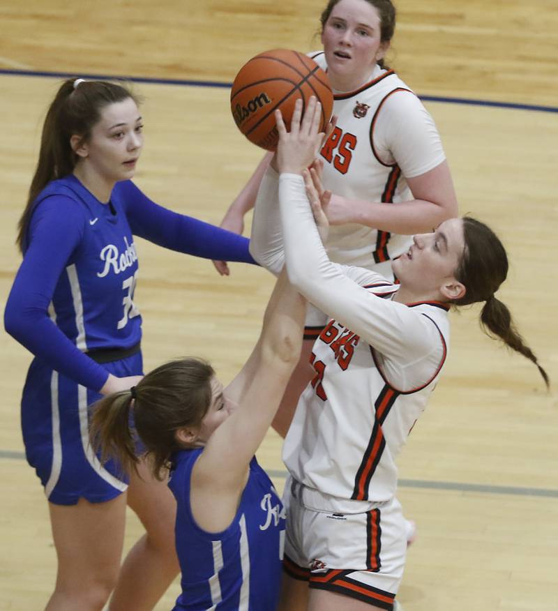 Crystal Lake Central's Katie Hamill shoots the ball over Burlington Central's Emersyn Fry during the IHSA Class 3A Woodstock Regional Championship girls basketball game on Thursday, Feb. 15, 2024, at Woodstock High School.