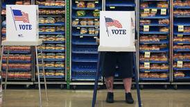 AP VoteCast: Economy ranked as a top issue, but concerns over democracy drove many voters to polls