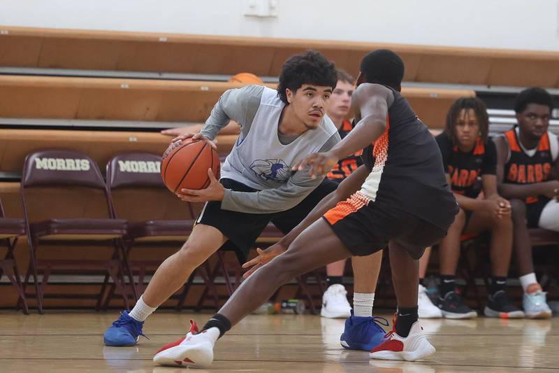 Joliet Central’s Eric Contreras looks to make a move against DeKalb at the 37th Morris Boys Shootout on Tuesday, June 25, 2024.