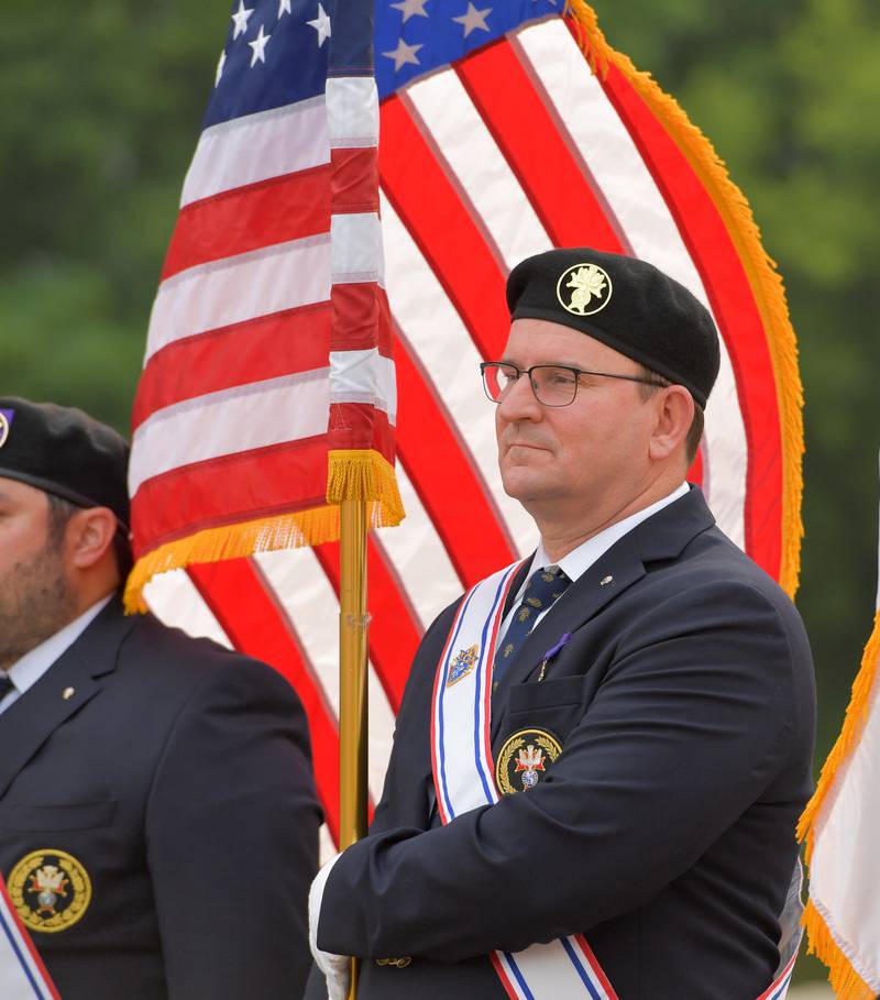The Knights of Columbus Marquette Assembly's John Emerson of Batavia carries the U.S. Flag during the Batavia Flag Day Ceremony on Wednesday, June 14, 2023.