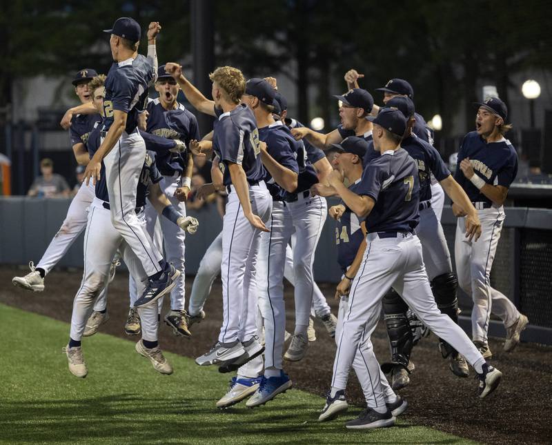 Teutopolis’ Jason Kreke celebrates with his team after hitting a two-run homer against Newman Friday, June 6, 2025, during the Class 2A state semifinal at Illinois Field in Champaign.