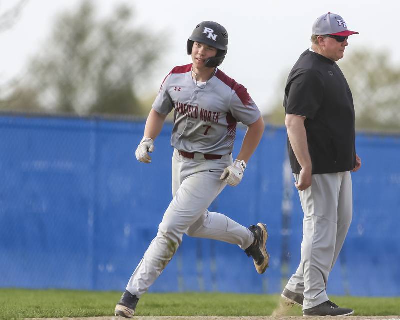 Plainfield North's Gavin Persson (7) rounds third after hitting a home run during a baseball game between Plainfield North and Oswego East, Monday, April 28, 2025 in Oswego.