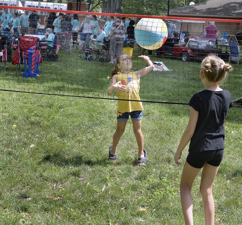 These two youngsters play a game of volleyball Tuesday, Aug. 8, 2023, with a beach ball during Unlimited Fun Day at City Park in Streator. The event was sponsored by Streator Unlimited.