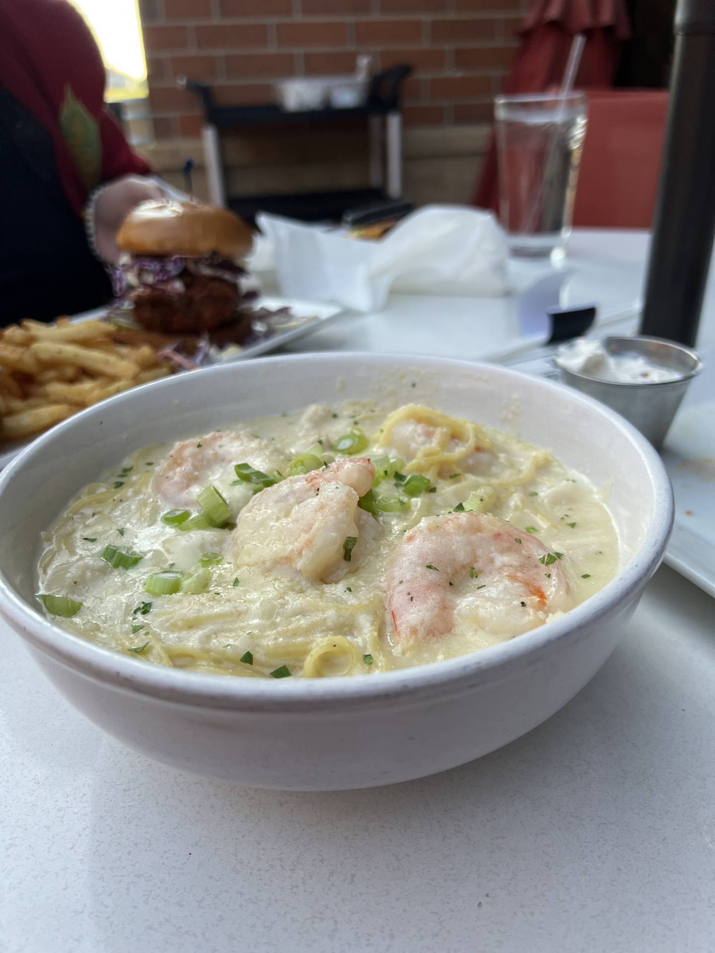 The seafood Alfredo at Village Vintner Winery and Brewery is topped with shrimp and scallops.