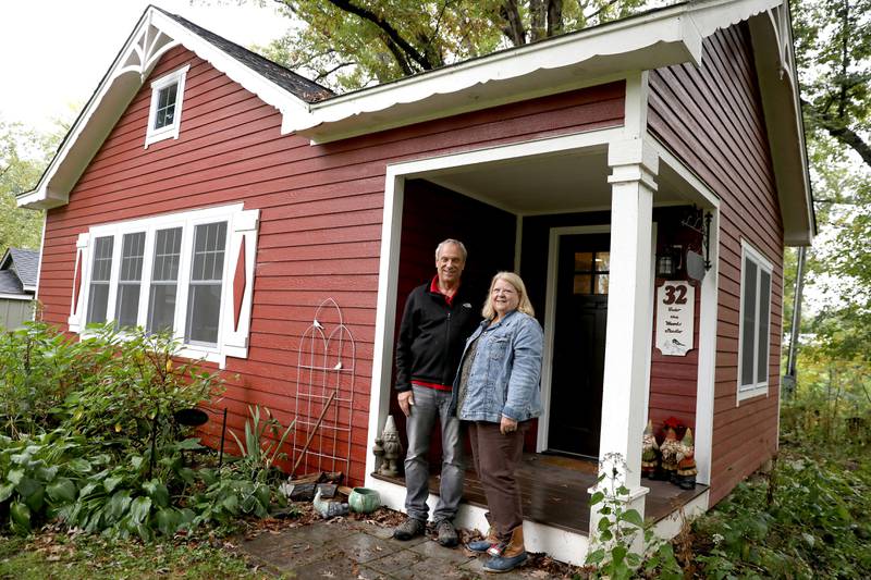 Karen and Kevin Kloubec outside their cottage at Good Templar Park in Geneva, where the Cottages in the Woods event will take place Oct. 21 and 22. The event will feature Swedish folk arts, gnomes and Swedish Santa.
