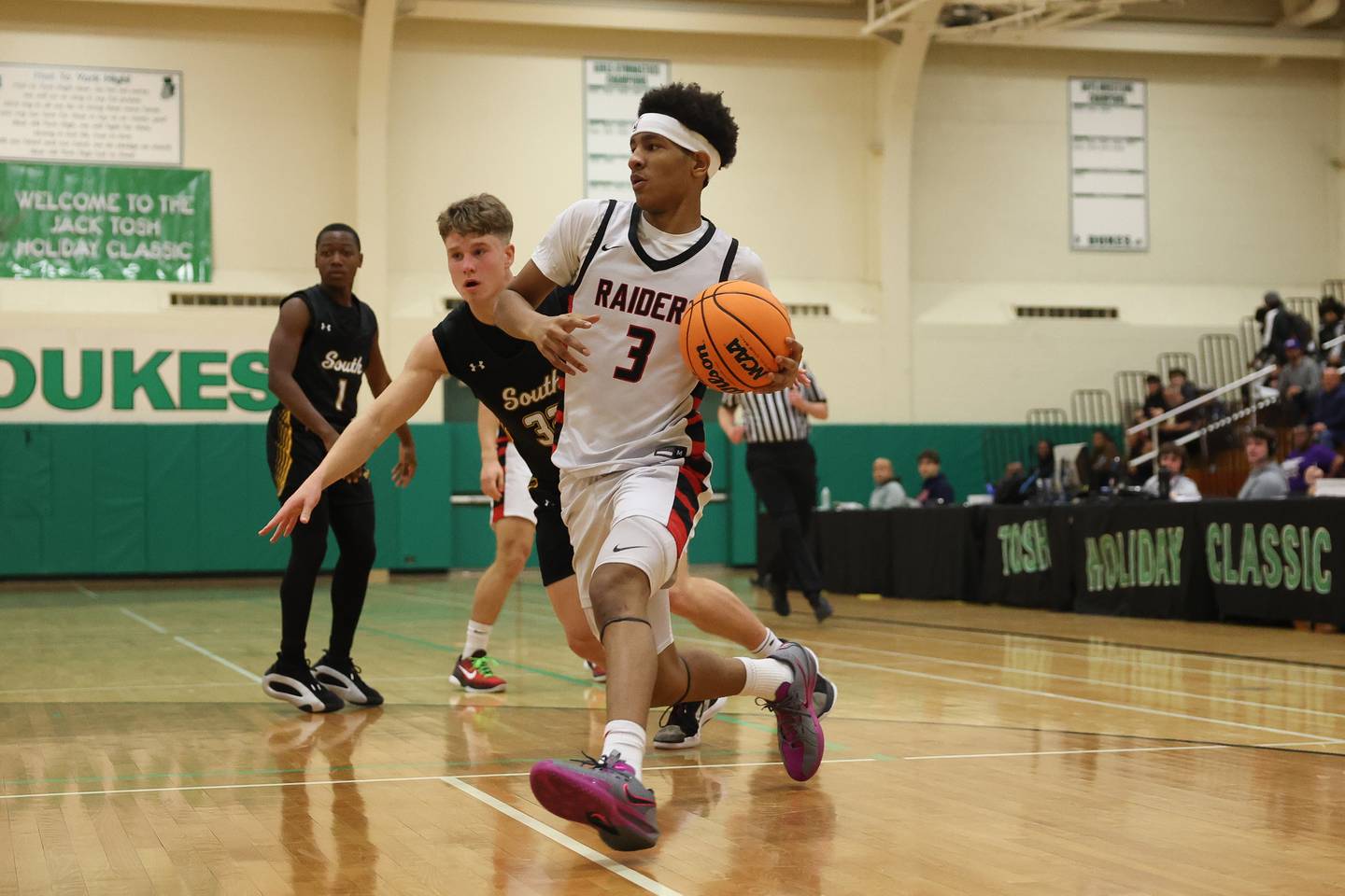 Bolingbrook’s Davion Thompson works along the baseline against Hinsdale South in the 50th Annual Jack Tosh Holiday Classic on Thursday, Dec. 26, 2024 at York High School.