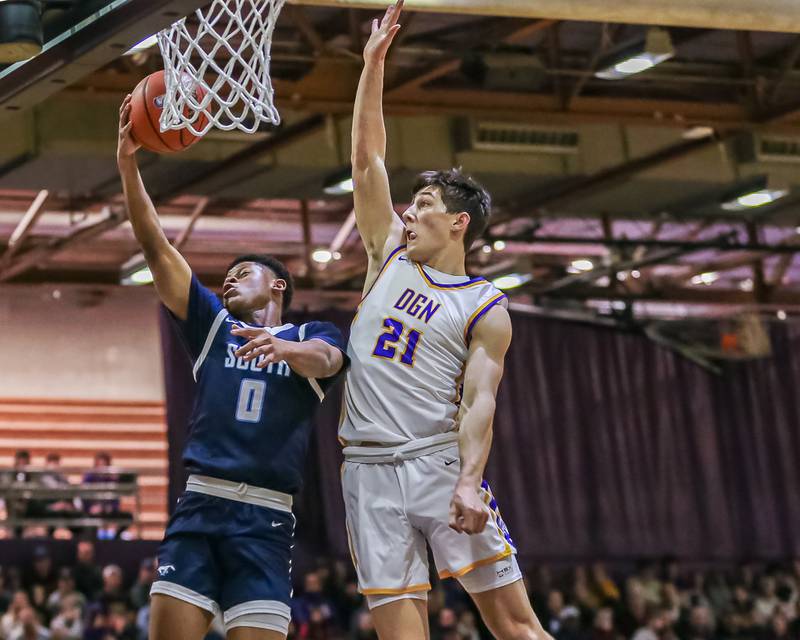 Downers Grove South's Will Potter (2) shoots a free throw during basketball game between Downers Grove South at Downers Grove North. Dec 16, 2023.