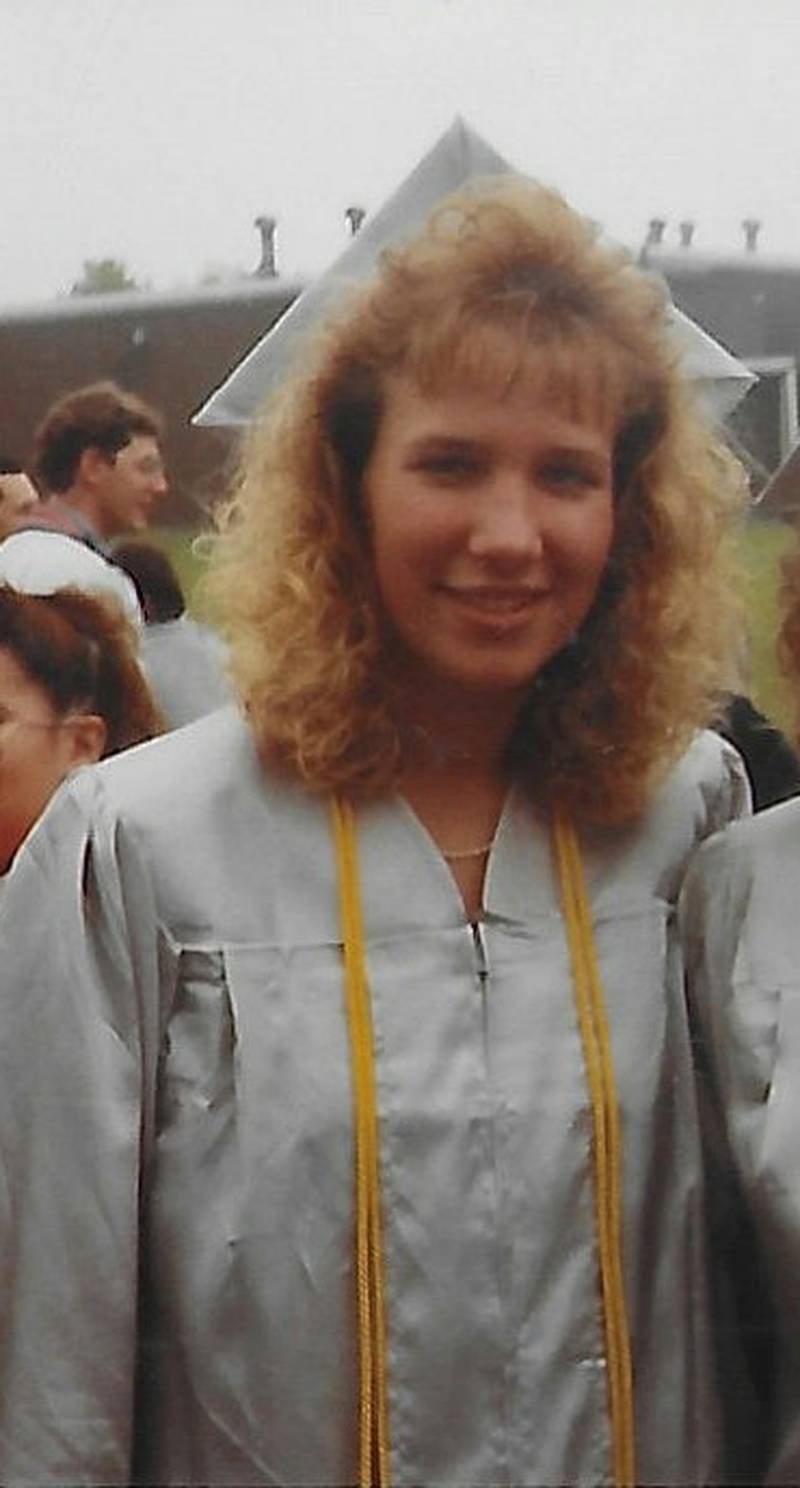 Kathy Twarowski, 19,  at her graduation ceremony at College of Lake County in 1990.