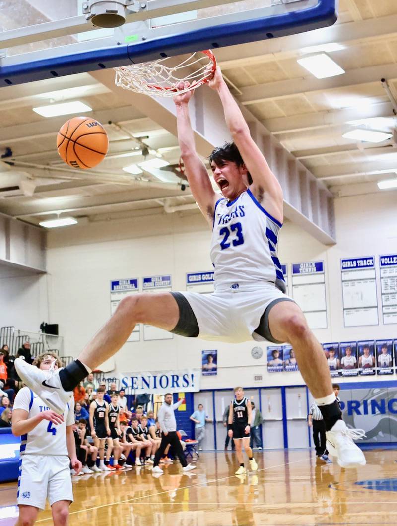 Princeton's Noah LaPorte slams the ball through in the fourth quarter of Saturday's game with. Byron at Prouty Gym. He scored 29 points to lead the Tigers to a 53-51, breaking the PHS all-time scoring record.