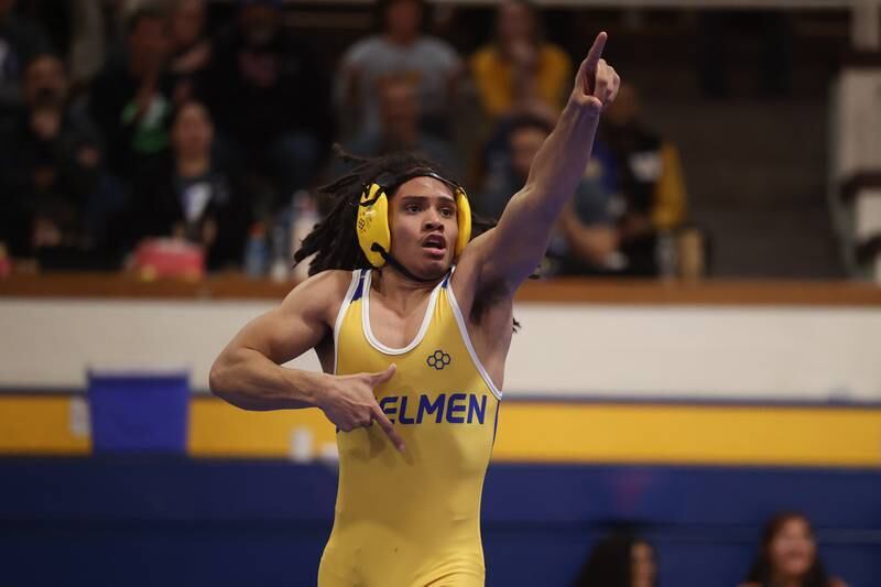 Joliet Central’s Jowel Maldonado celebrates a win over Joliet West’s Joseph Jaburek in the 126-pound weight match at Joliet Central on Friday, Jan 31, 2025.