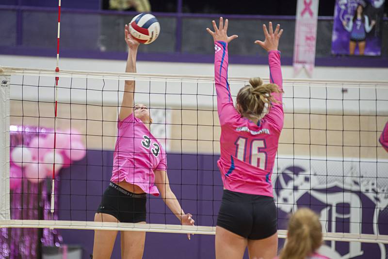 Dixon's Ella Govig works the net against Genoa-Kingston Thursday, Oct. 6, 2022.
