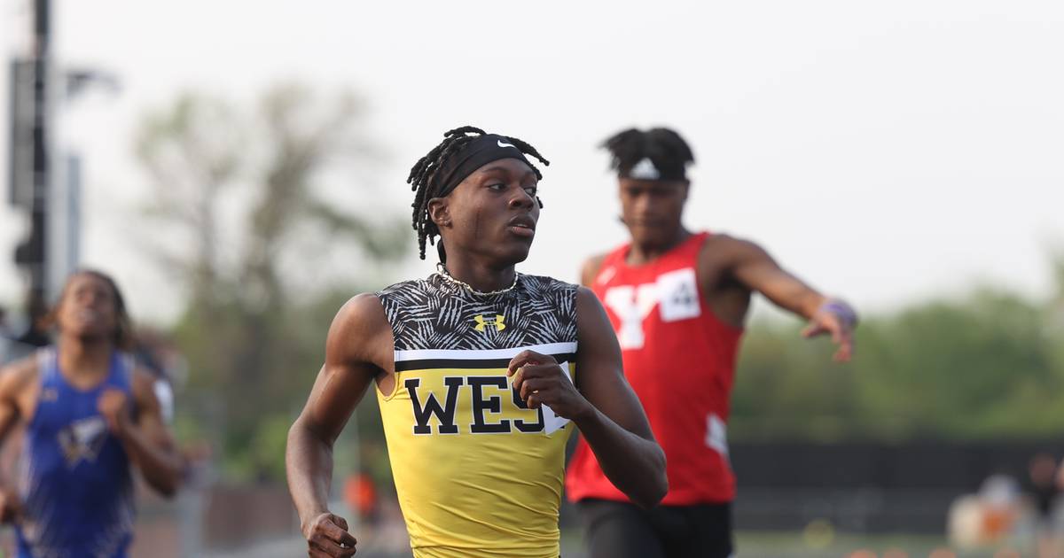 Boys track and field Joliet West’s Billy Bailey Jr. runs past the