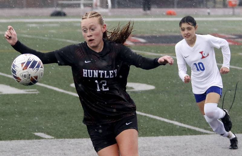 Huntley’s Avery Suess controls the ball in front of Larkin’s Jessica Rodriguez during a nonconference soccer match on Thursday, March 26, 2026, at Huntley High School.