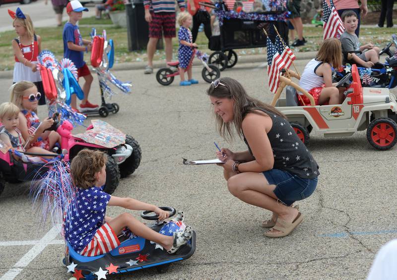 WTVO meteorologist Candice King talks with some of the kids who entered the Let Freedom Ring Kiddie Parade on Saturday, July 5, 2025. King was the judge for the event.