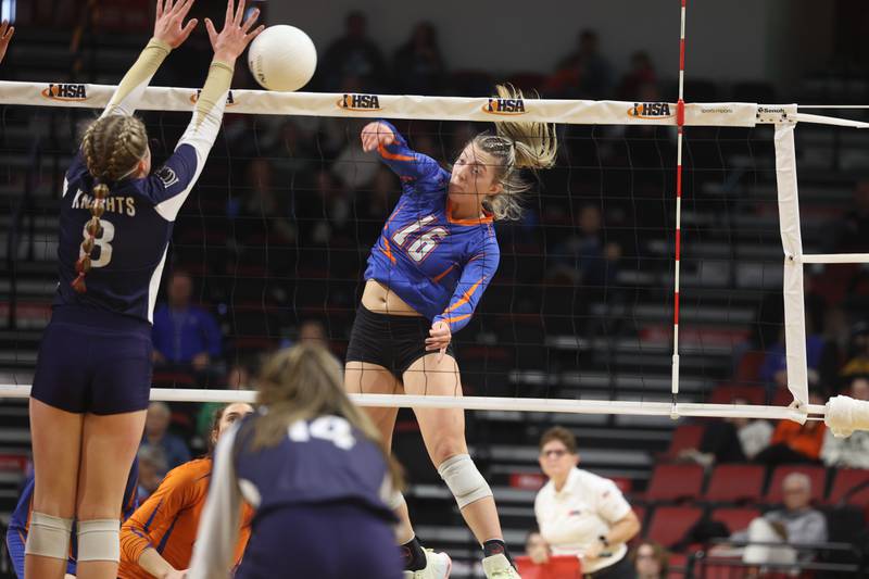 Genoa-Kingston’s Alayna Pierce powers a shot against IC Catholic in the Class 2A championship match on Saturday in Normal.