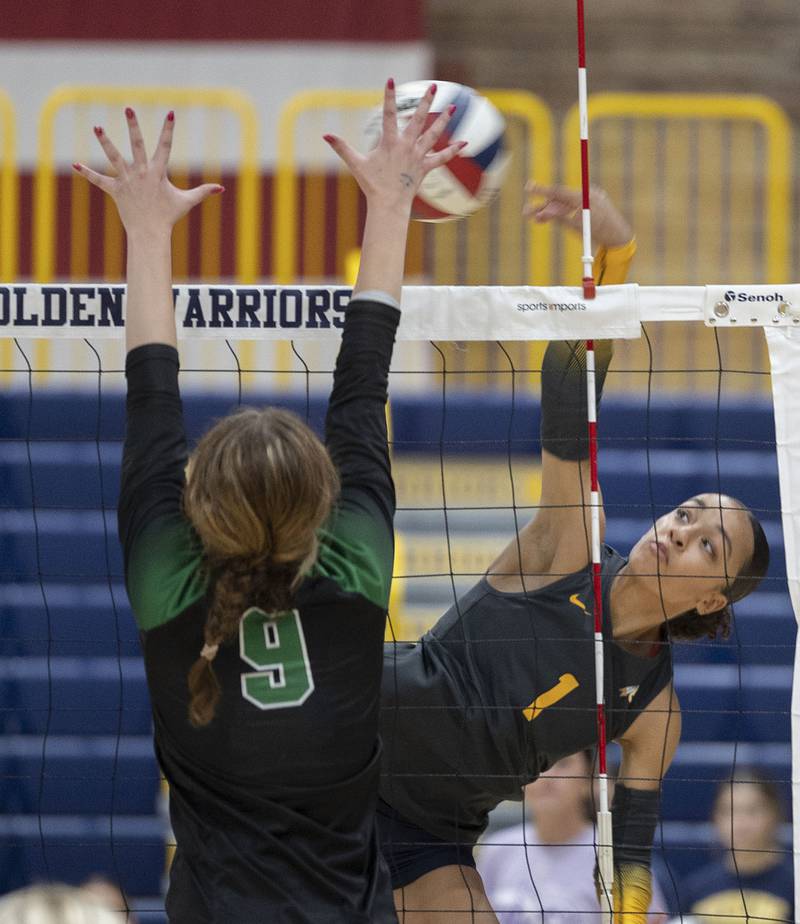 Sterling’s Nia Harris hammers a shot against Alleman Thursday, Sept. 25, 2025.