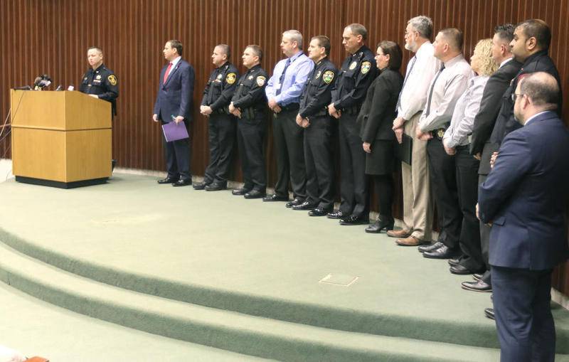 DeKalb County Sheriff's Chief Deputy Andy Sullivan speaks while flanked by area law enforcement representatives Tuesday during a press conference announcing the arrest of Jonathan D. Hurst on charges of first-degree murder in the killing of Patricia and Robert Wilson of Sycamore.