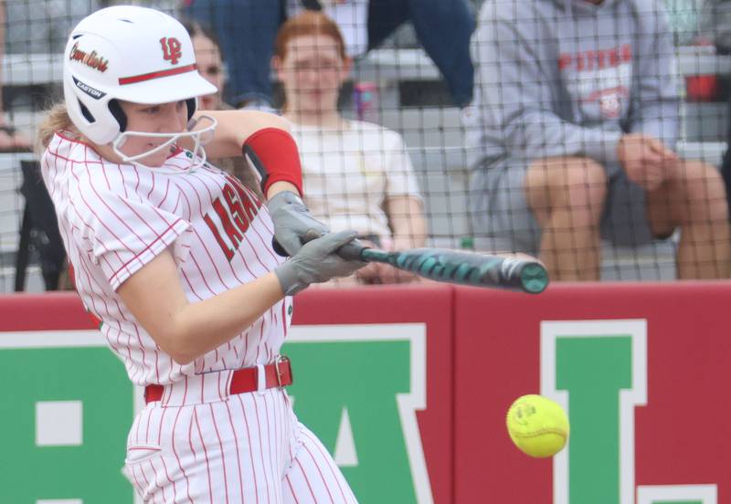 L-P's Shayla Turczyn makes contact with the ball on Friday, March 20, 2026 at the L-P Athletic Complex in La Salle.