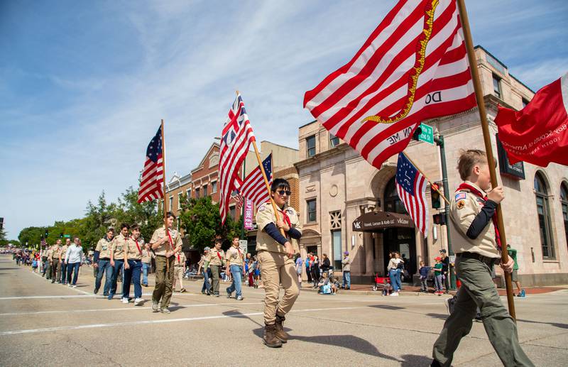 Scouts march in the St. Charles Memorial Day Parade in downtown St. Charles on Monday, May 26, 2025.