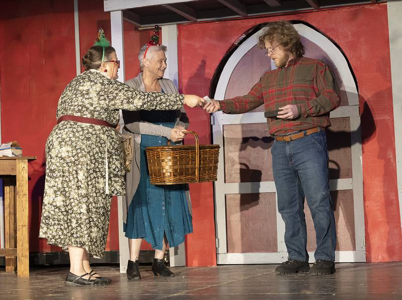 Kristin DuBois (left), Mary Jo Frederick and Micah Green work on a scene Wednesday, Dec. 4, 2024, for Polo Area Community Theatre’s upcoming rendition of “Fruitcakes.” Show performances will be at 7 p.m. Friday, Dec. 13; 2 and 7 p.m. Saturday, Dec. 14, and 2 p.m. Sunday, Dec 15, at the Polo Town Hall.