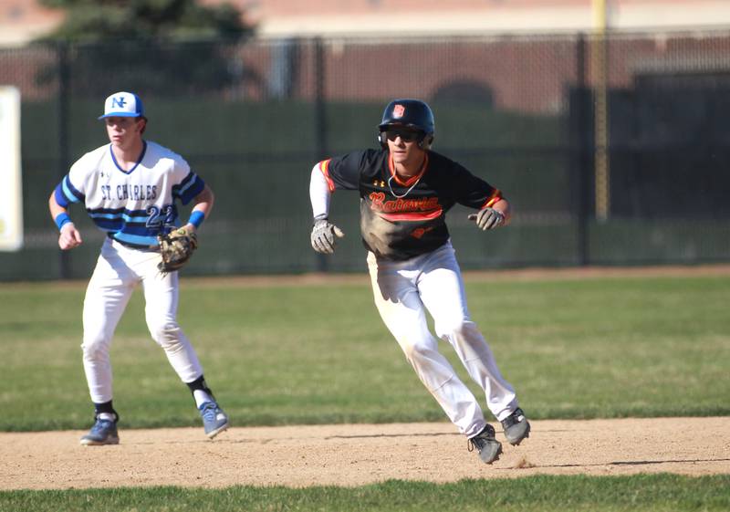 Batavia’s Ryne Woods leads off from second base during a game at St. Charles North on Monday, April 15, 2024.