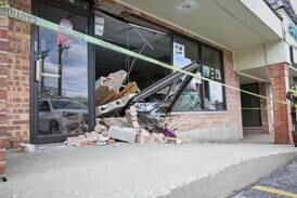 Car crashes into building in Woodstock Tuesday